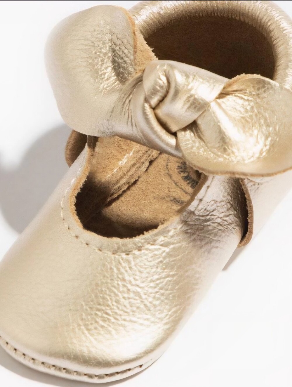 Freshly Picked Platinum Moccasins Size 5